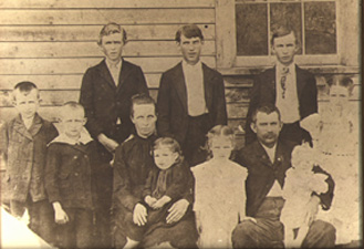 FAMILY PORTRAIT OF JOHN FRANKLIN AND ONIE BASSINGER